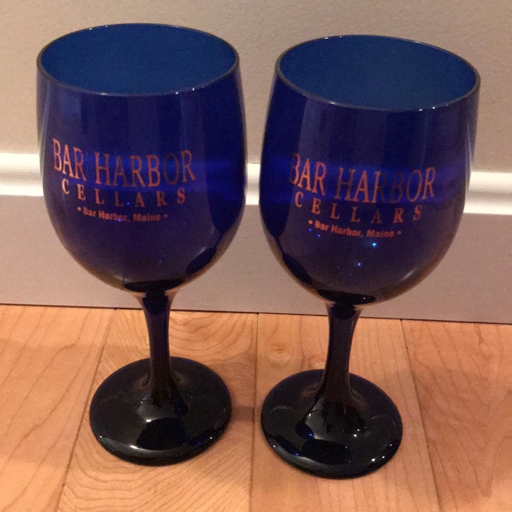 Two blue glass wine glasses